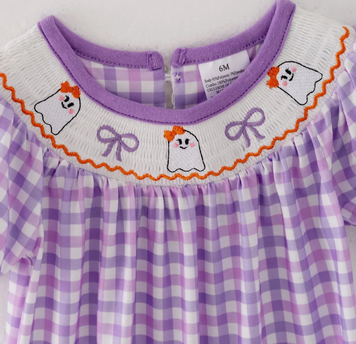 Purple checkered ghost smocked baby romper